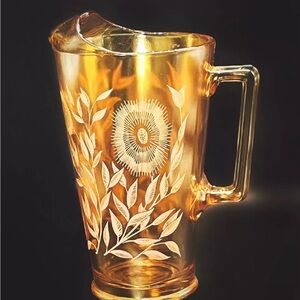 Vintage JEANETTE Iridescent Marigold Carnival Glass Pitcher White Cosmos Design